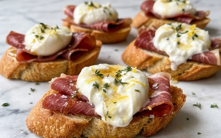 Beef Prosciutto Crostini with Burrata and Lemon Honey Drizzle